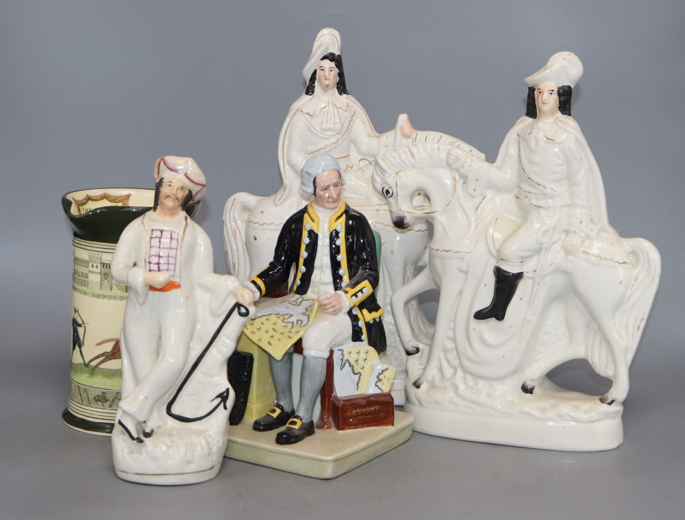 Three Staffordshire figures, a Doulton jug and a Doulton figure Captain Cook